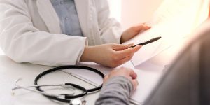 doctor diagnosing a patient